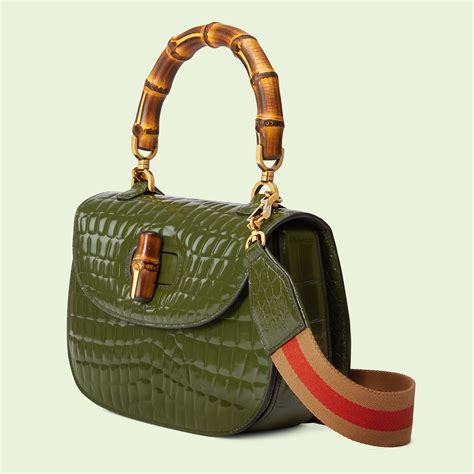 gucci alligator purse.